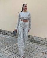 Elegante tweedelig set met top met lange mouwen en stijlvolle broek