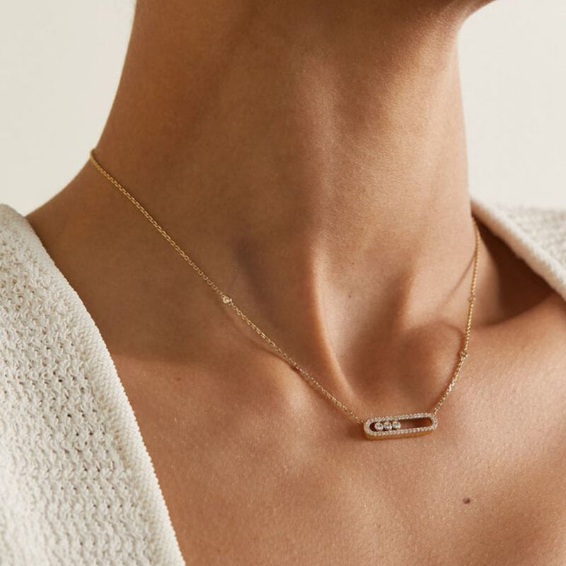 Delicate ketting met drie hangende ronde accenten