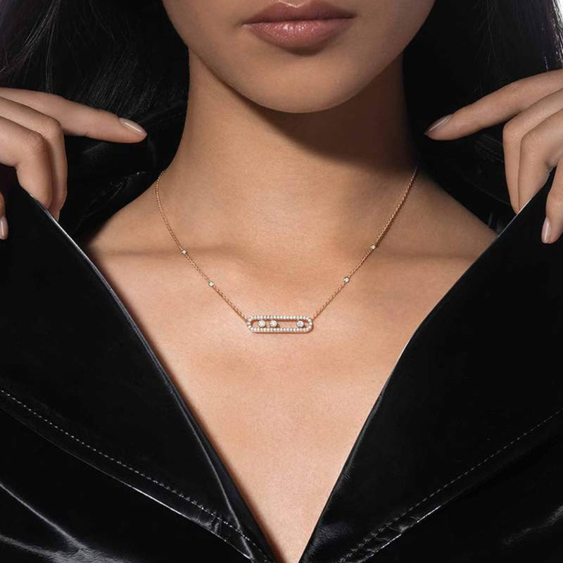 Delicate ketting met drie hangende ronde accenten