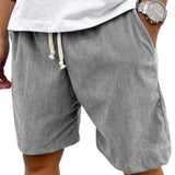 Losse shorts met trekkoord in de taille en zijzakken