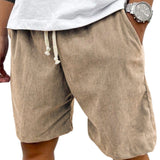 Losse shorts met trekkoord in de taille en zijzakken