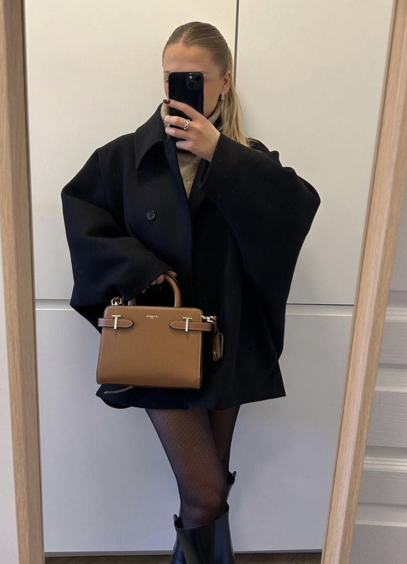 Elegante mini manteljas