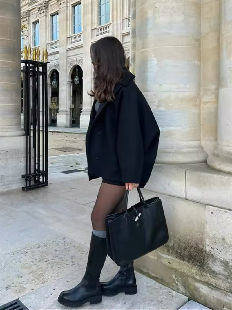 Elegante mini manteljas