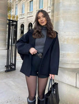 Elegante mini manteljas