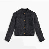 Licht damesvest met knoopjes