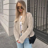Licht damesvest met knoopjes