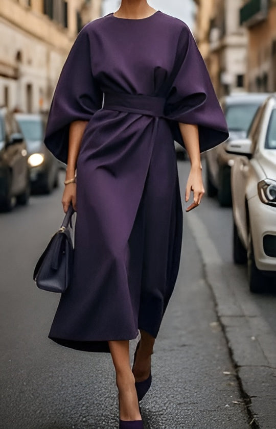 Minimalistische luxueuze jurk met riem