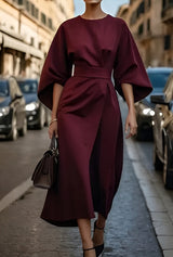 Minimalistische luxueuze jurk met riem
