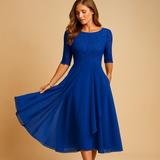 Flowy midi jurk met korte mouwen en hoge tailleband