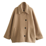 Elegante mini manteljas
