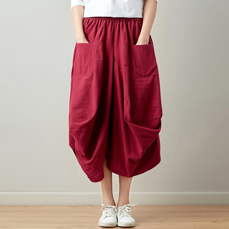 Relaxte gedrapeerde broek met praktische zakken en vloeiend silhouet
