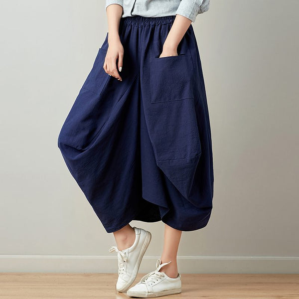 Relaxte gedrapeerde broek met praktische zakken en vloeiend silhouet