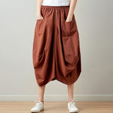 Relaxte gedrapeerde broek met praktische zakken en vloeiend silhouet