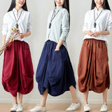 Relaxte gedrapeerde broek met praktische zakken en vloeiend silhouet