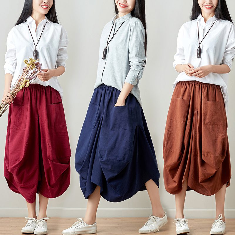 Relaxte gedrapeerde broek met praktische zakken en vloeiend silhouet
